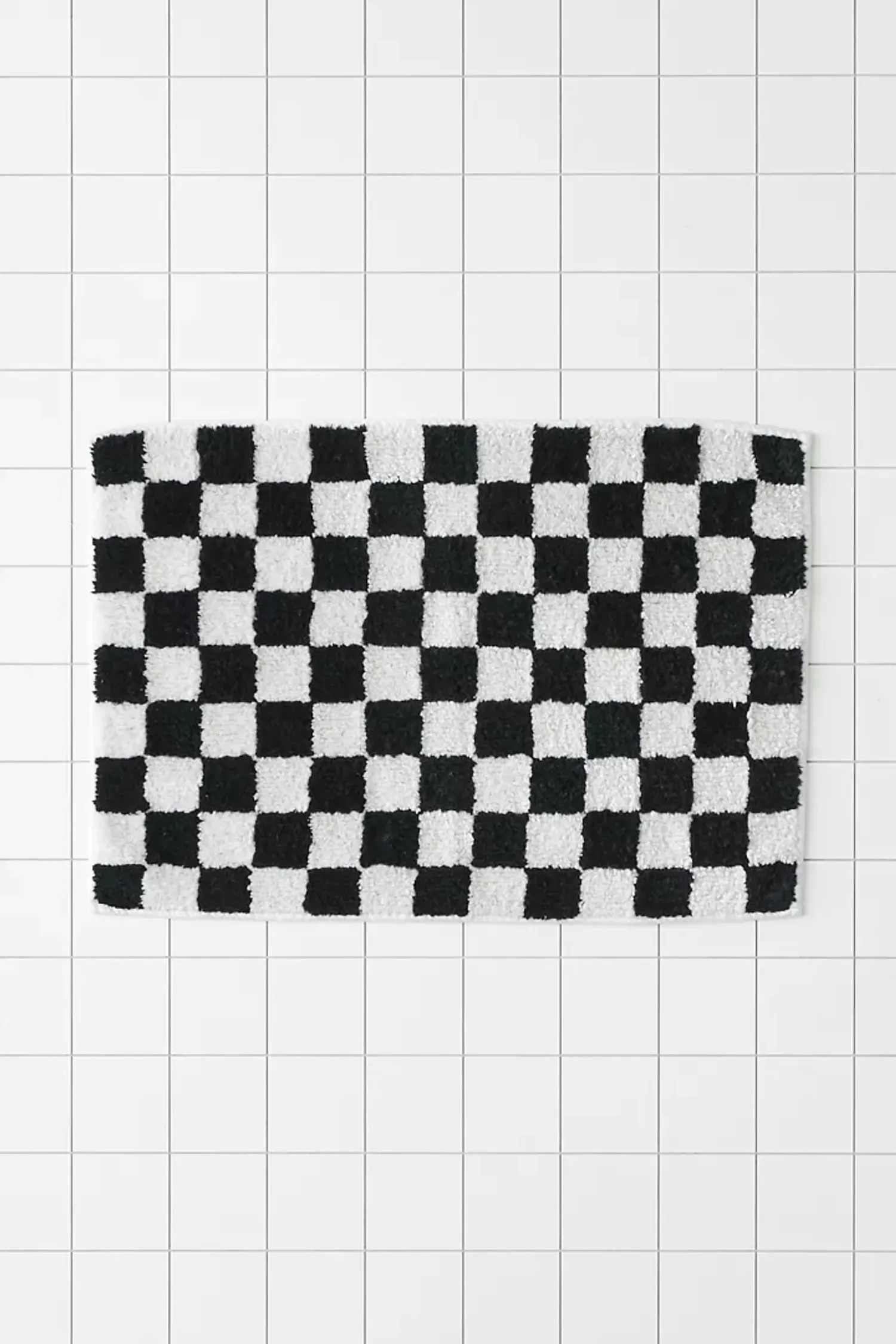 Shop Checkerboard Bath Mat from Urban Outfitters on Openhaus