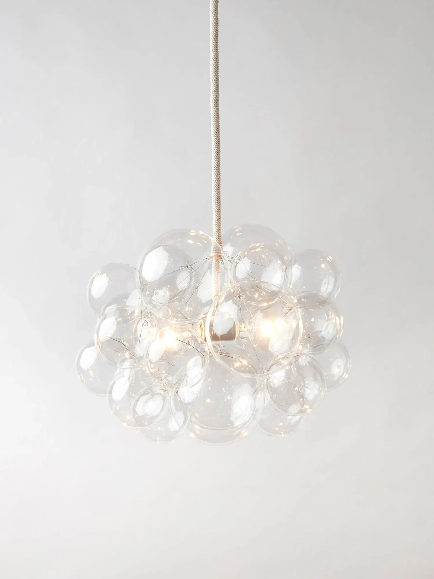 Shop The 25 Bubble Chandelier (18" diameter) in gold leather w/ brass canopy  from Etsy on Openhaus